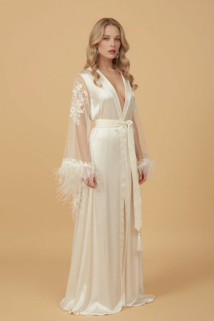 Woman wearing a white lace robe against a beige background