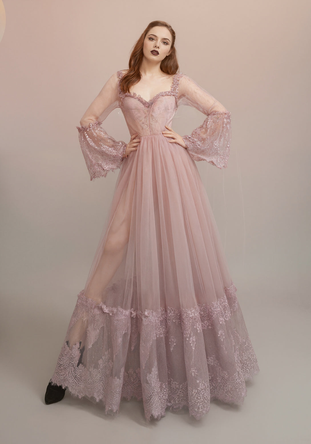 Rose Enchantress – Blush Pink Tulle Gown with Lace Bell Sleeves & Embroidered Hem